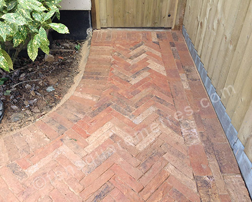 herringbone clay pavers with kiln-dried sand